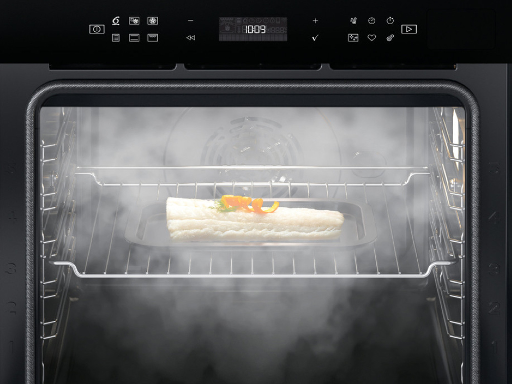 Plat vapeur Whirlpool spécialement conçu pour cuire les aliments à la vapeur  avec la fonction vapeur dans les fours à micro-ondes. Préparer des plats  sains à la vapeur ou cuire du riz