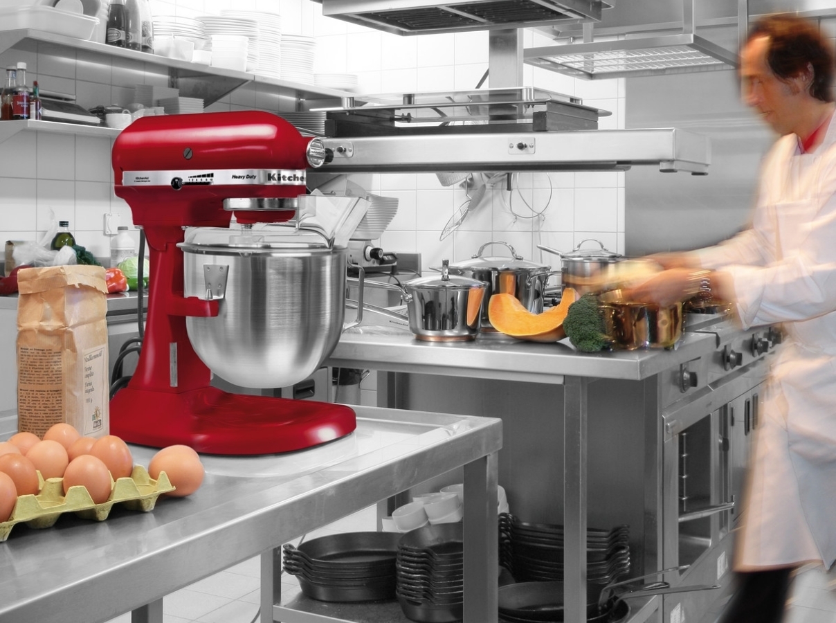 Red mixer bowl lift in professional kitchen
