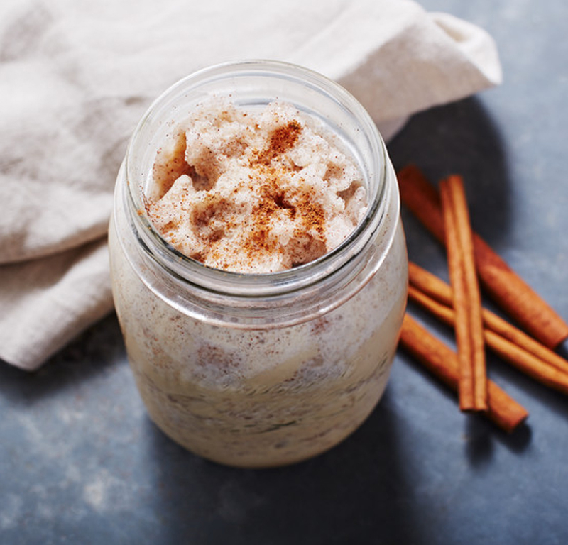 Coffee frappé with frothed milk and cinnamon