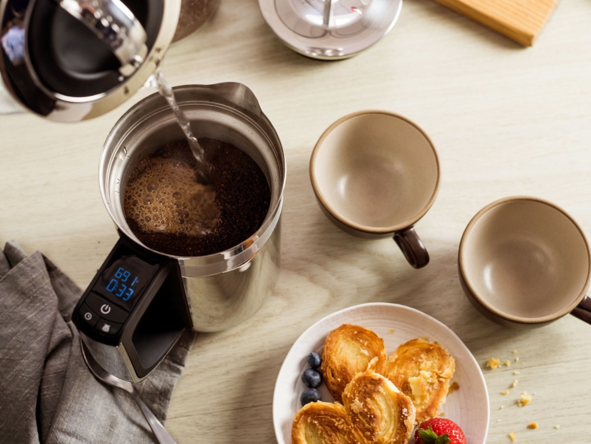Add some water into French press coffee maker