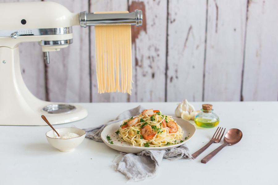Stainless steel pasta maker attachment with pasta dish
