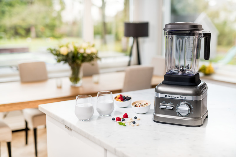 Grey blender with yoghurt and fruits