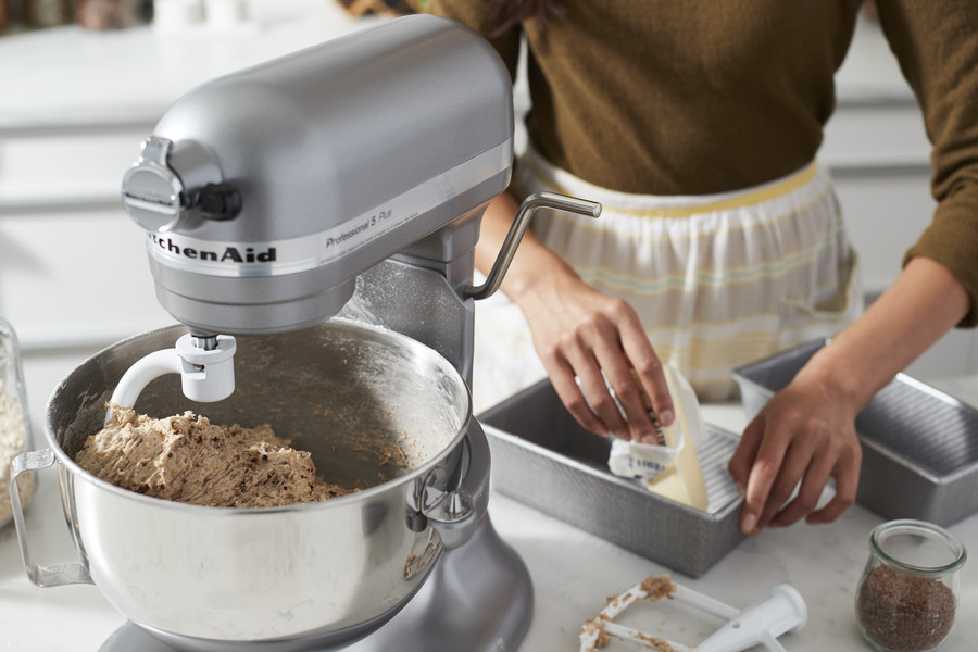 Stand mixer with dough hook kneading dough