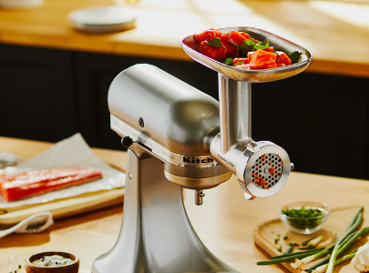 Food grinder grinding vegetables