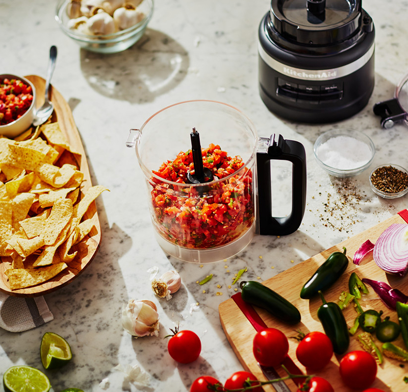 Creating salsa sauce in black food processor