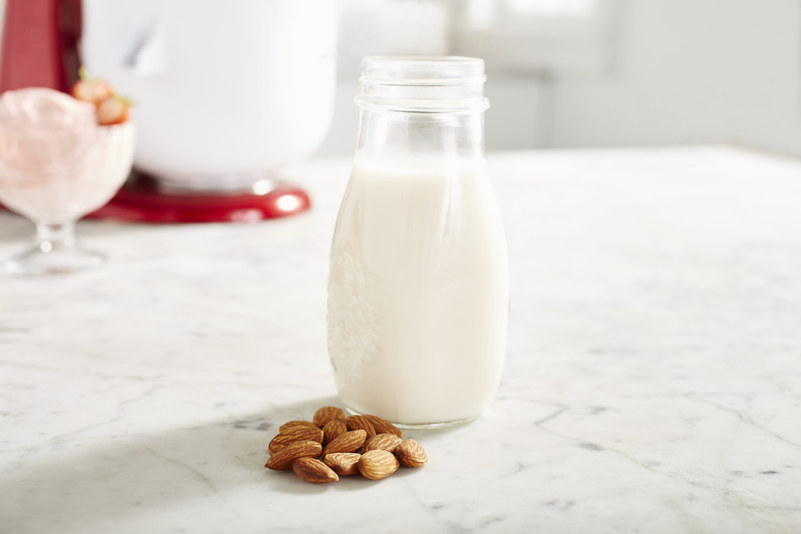 Almond milk stored in a glass jar