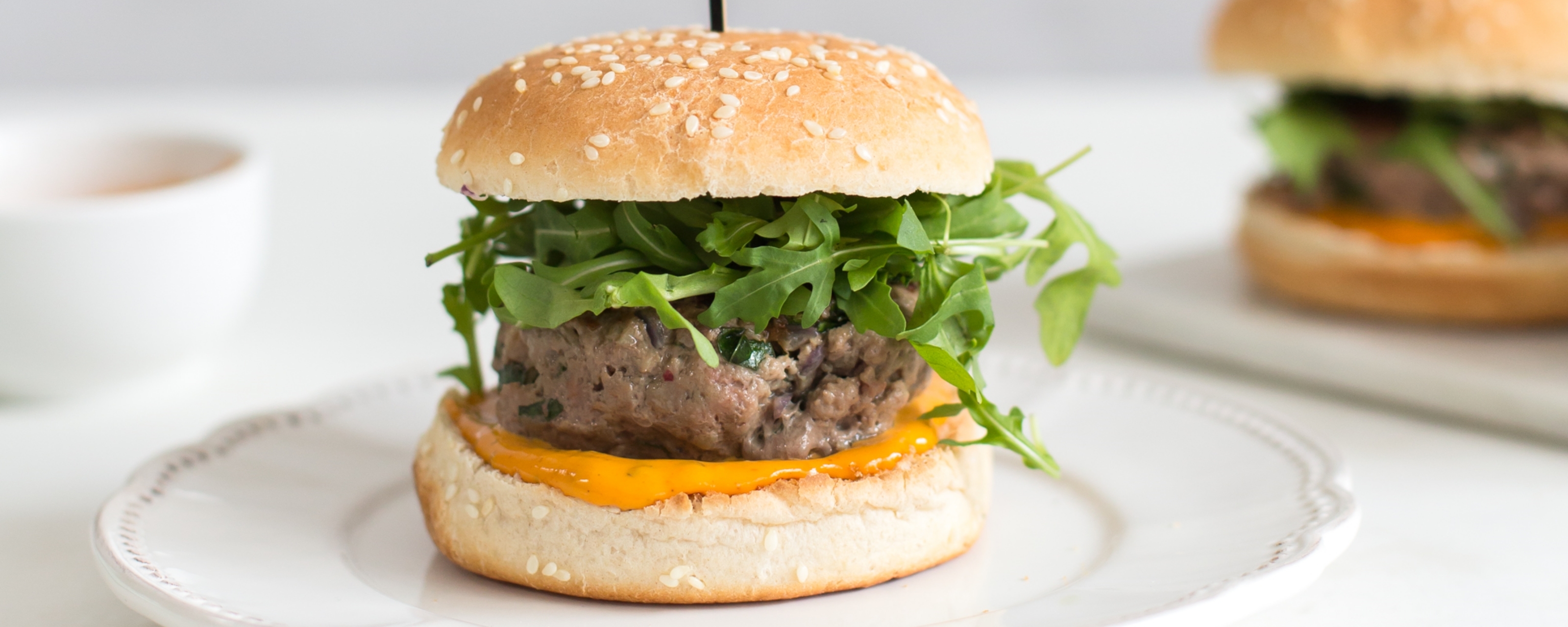 Homemade burger with cheese and rucola