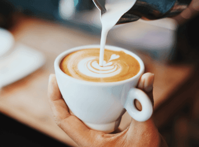 Art latte in coffee cup