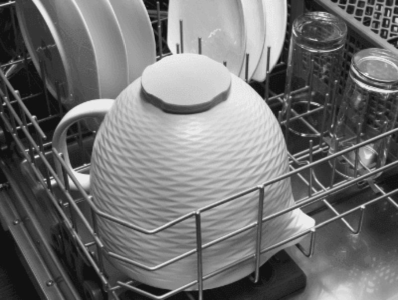 White mixing bowl in a dishwasher
