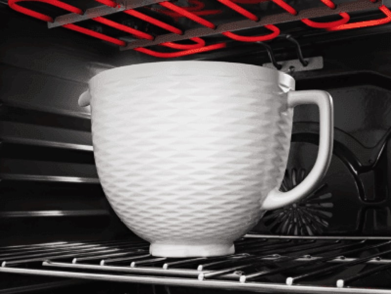White mixing bowl in the oven