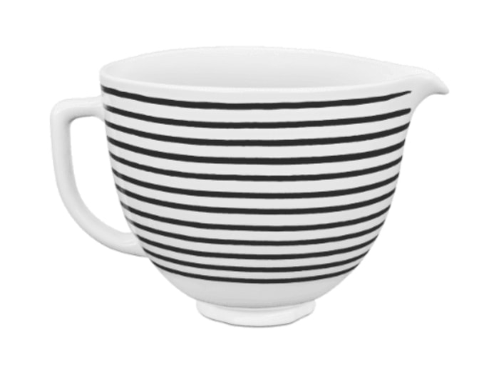 White ceramic mixing bowl in black horizontal stripes