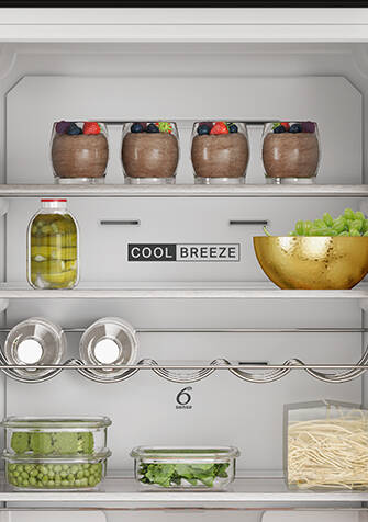 Whirlpool W7 Total NoFrost koel-vriescombinatie met open deuren